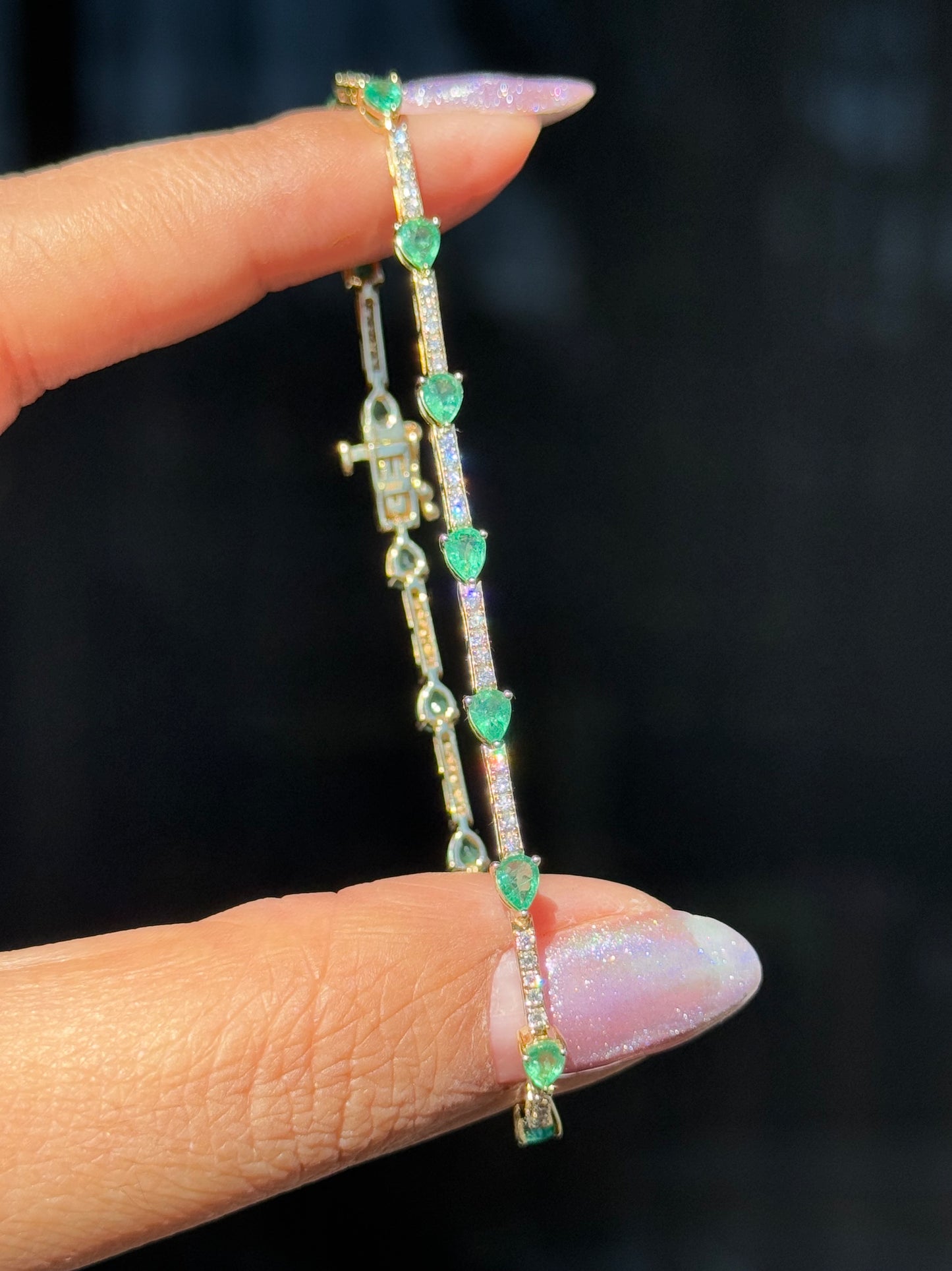 14k Yellow Gold Emeralds and diamonds tennis Bracelet