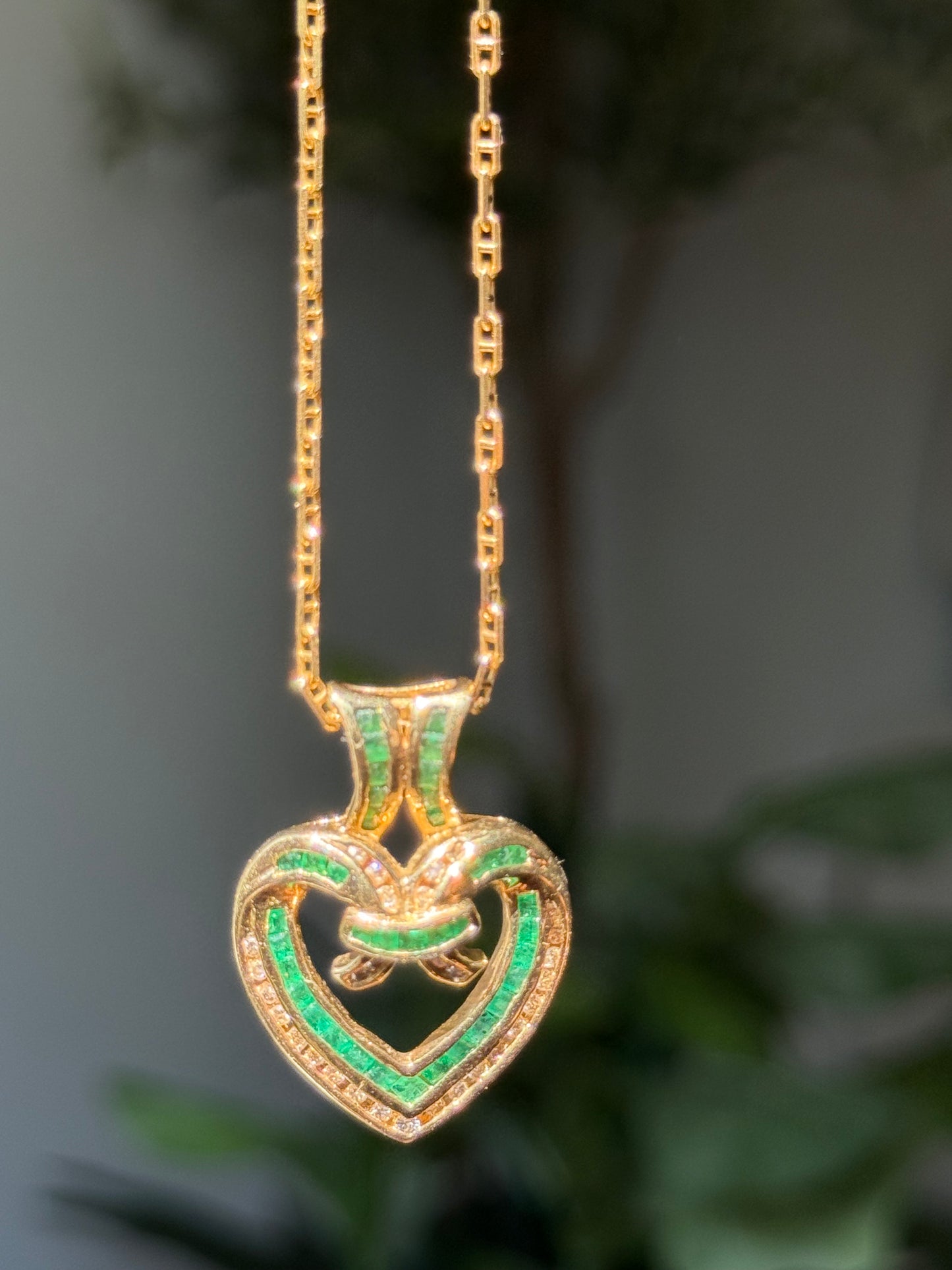 14k Glowy emeralds and diamonds open heart charm