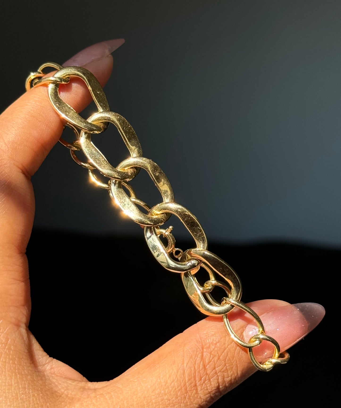 18k wide open /Cuban
link bracelet