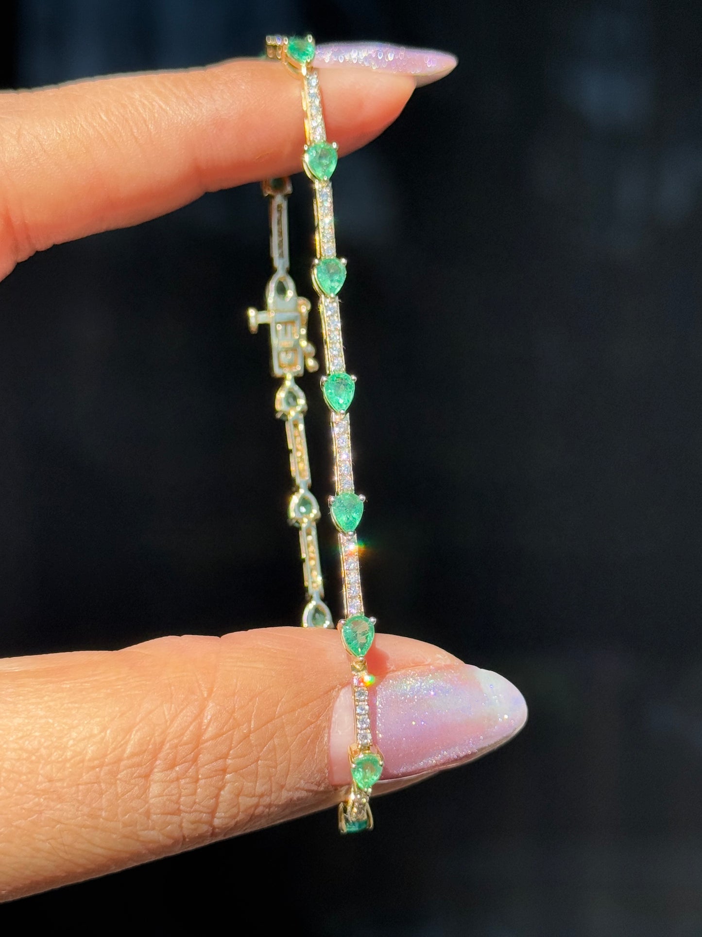 14k Yellow Gold Emeralds and diamonds tennis Bracelet