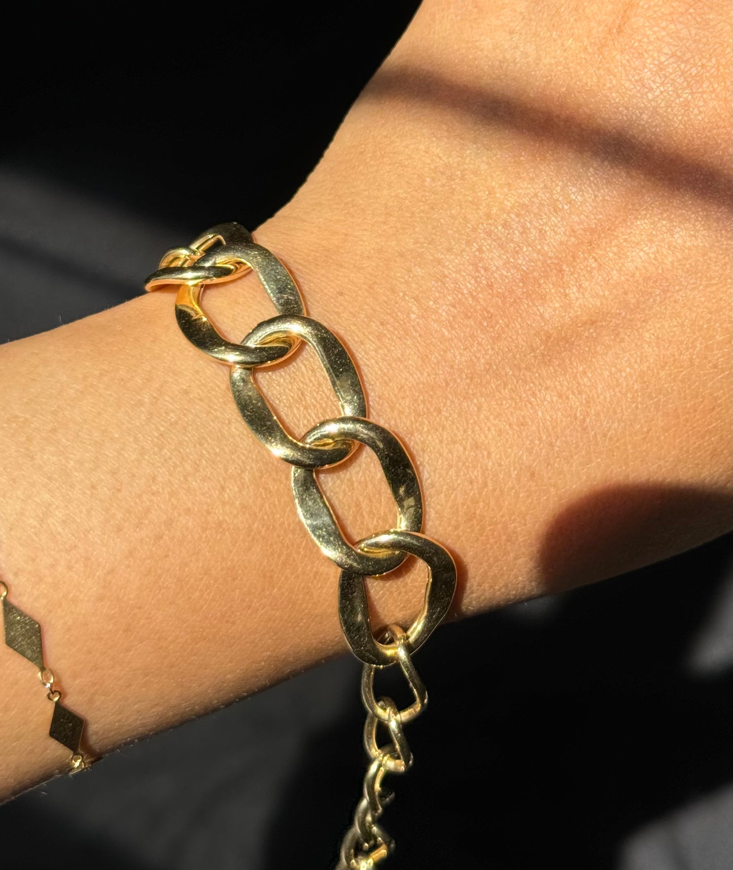 18k wide open /Cuban
link bracelet