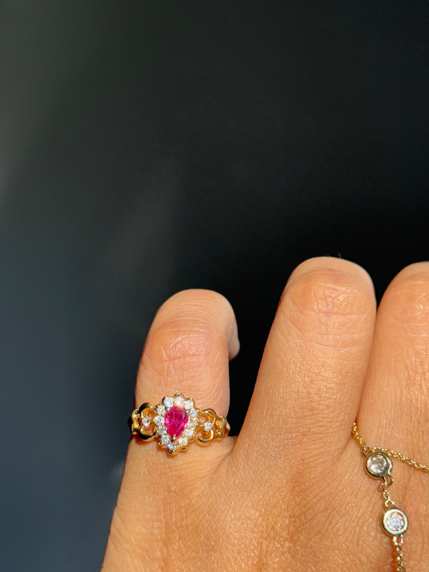 18k solitaire Ruby and diamonds halo ring