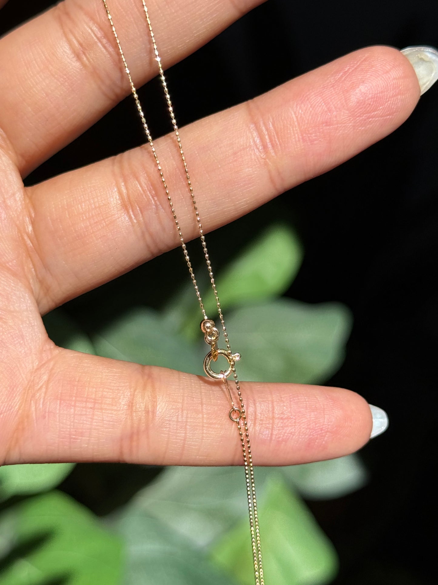 18k Articulated diamond charm + chain