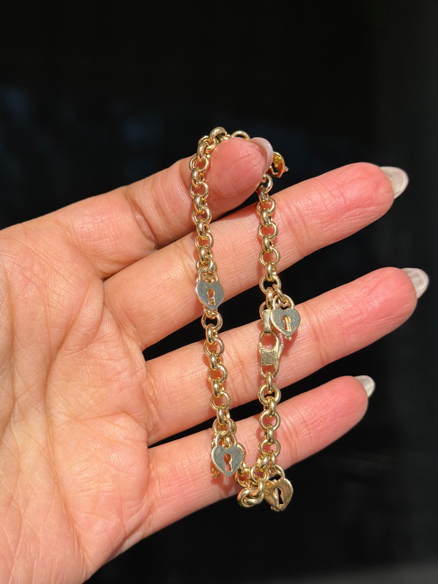 14k rolo bracelet with heart padlocks
