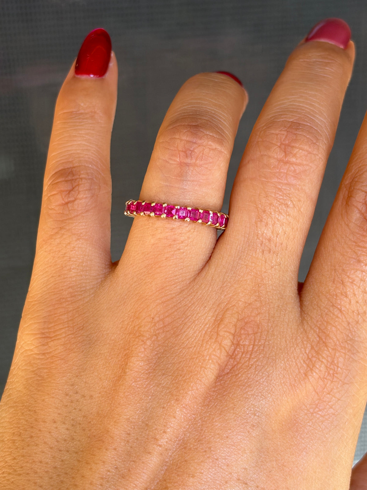 14k Ruby eternity band