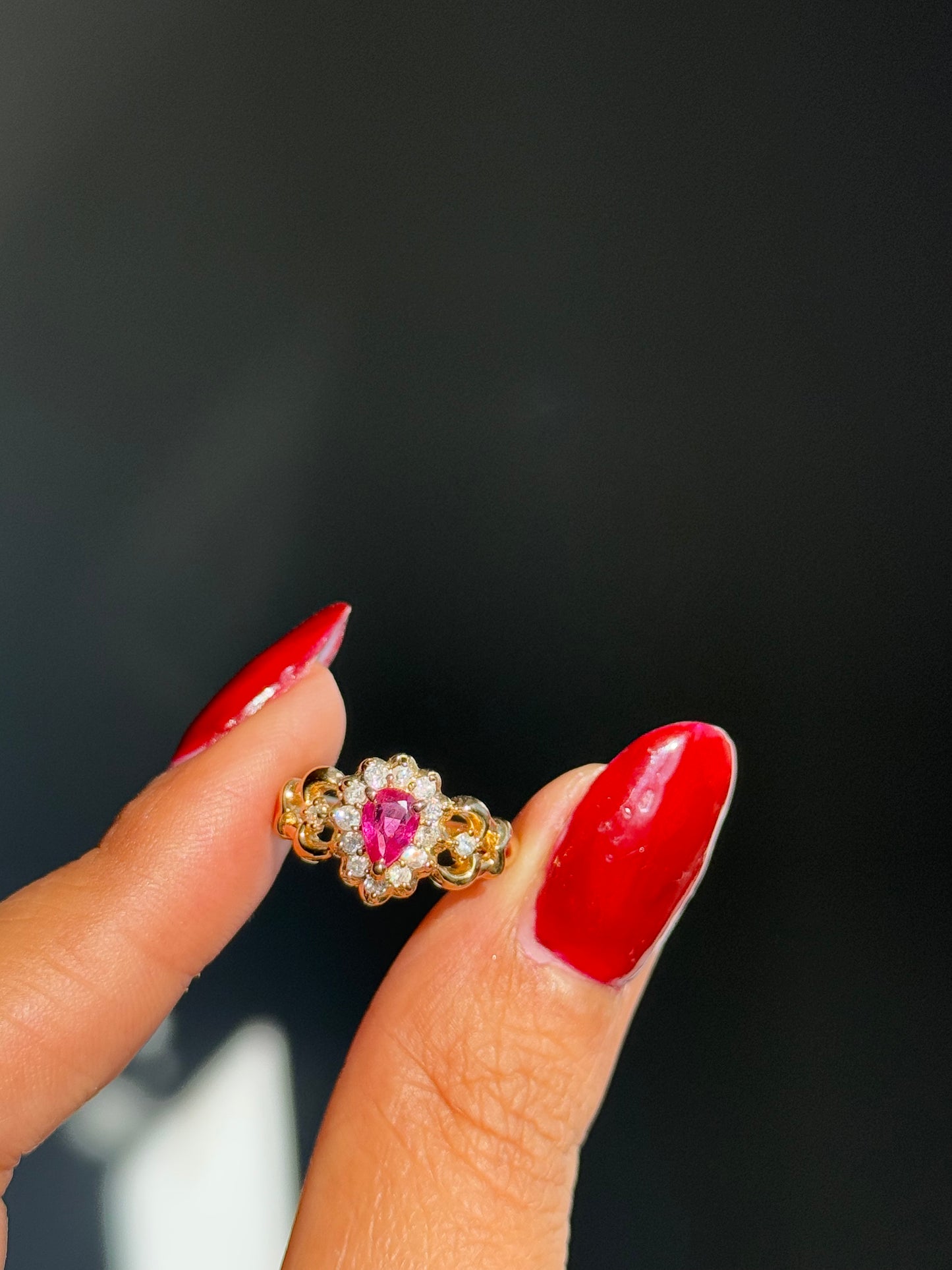 18k solitaire Ruby and diamonds halo ring