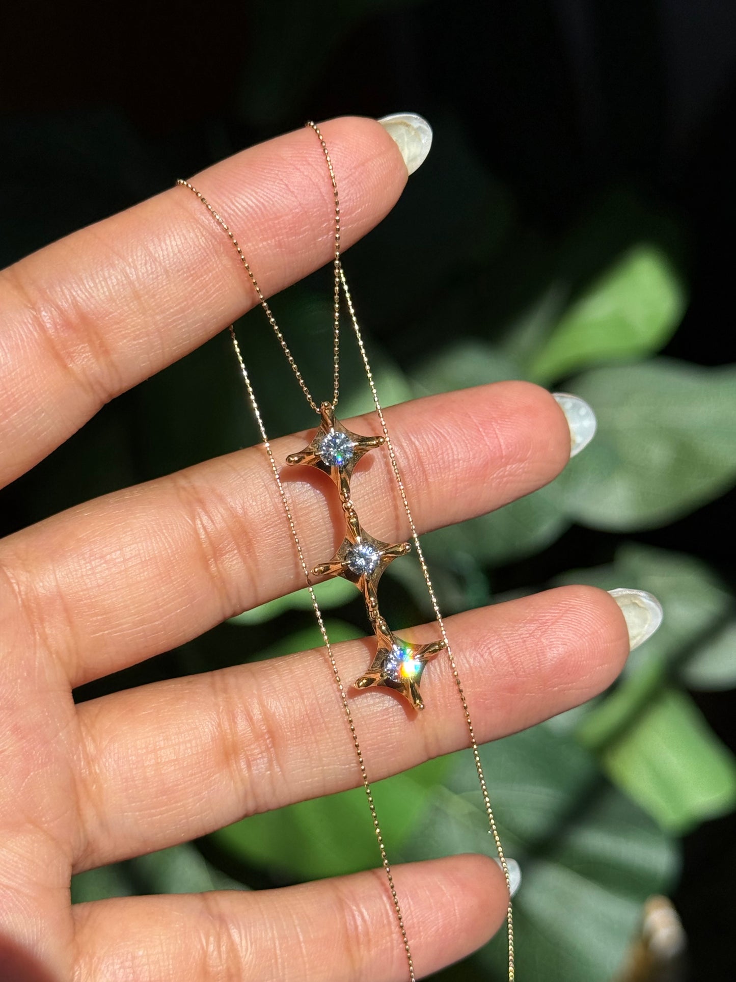 18k Articulated diamond charm + chain